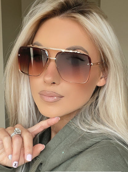 Lunettes de soleil de luxe à monture métallique. Unisexe